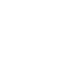 A bright white, eight-pointed starburst shape with long, thin rays radiating symmetrically from the center on a light gray back
